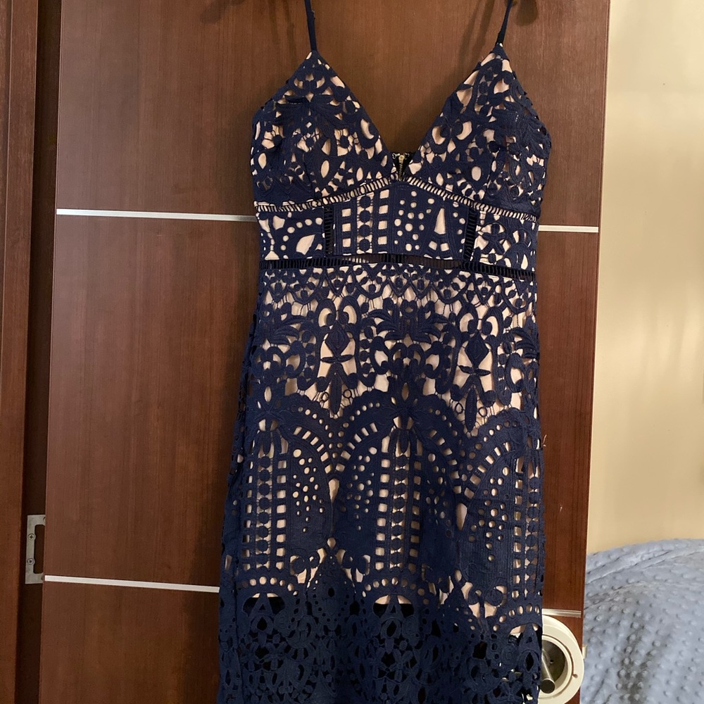 V-Neck crochet lace dress in navy blue.